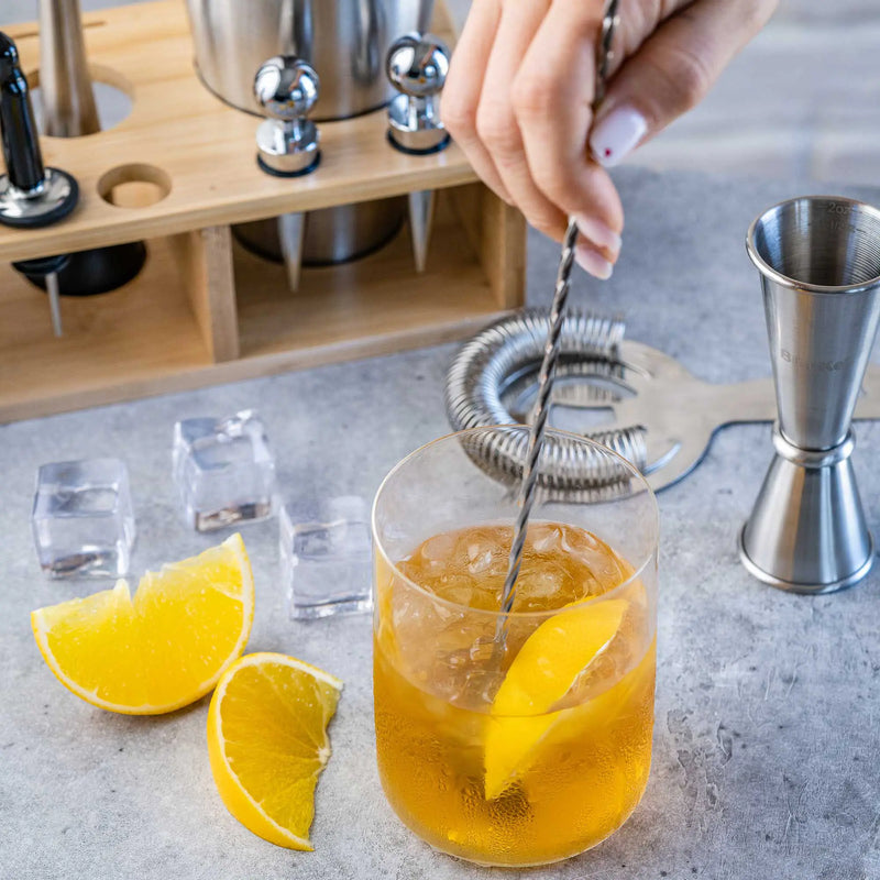 Stainless Steel 17-Piece Cocktail Shaker Set with Stand - Includes 25oz Shaker, Jigger, Strainer, Muddler, and Mixing Spoon.